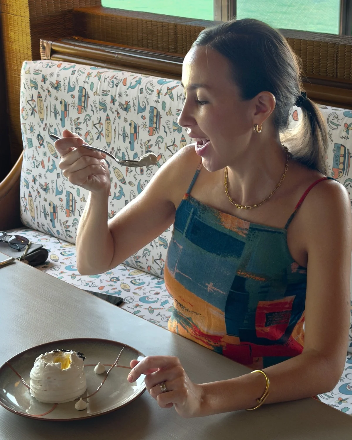 Guest enjoying a Flaming Alaska dessert at a Plantation Bay restaurant