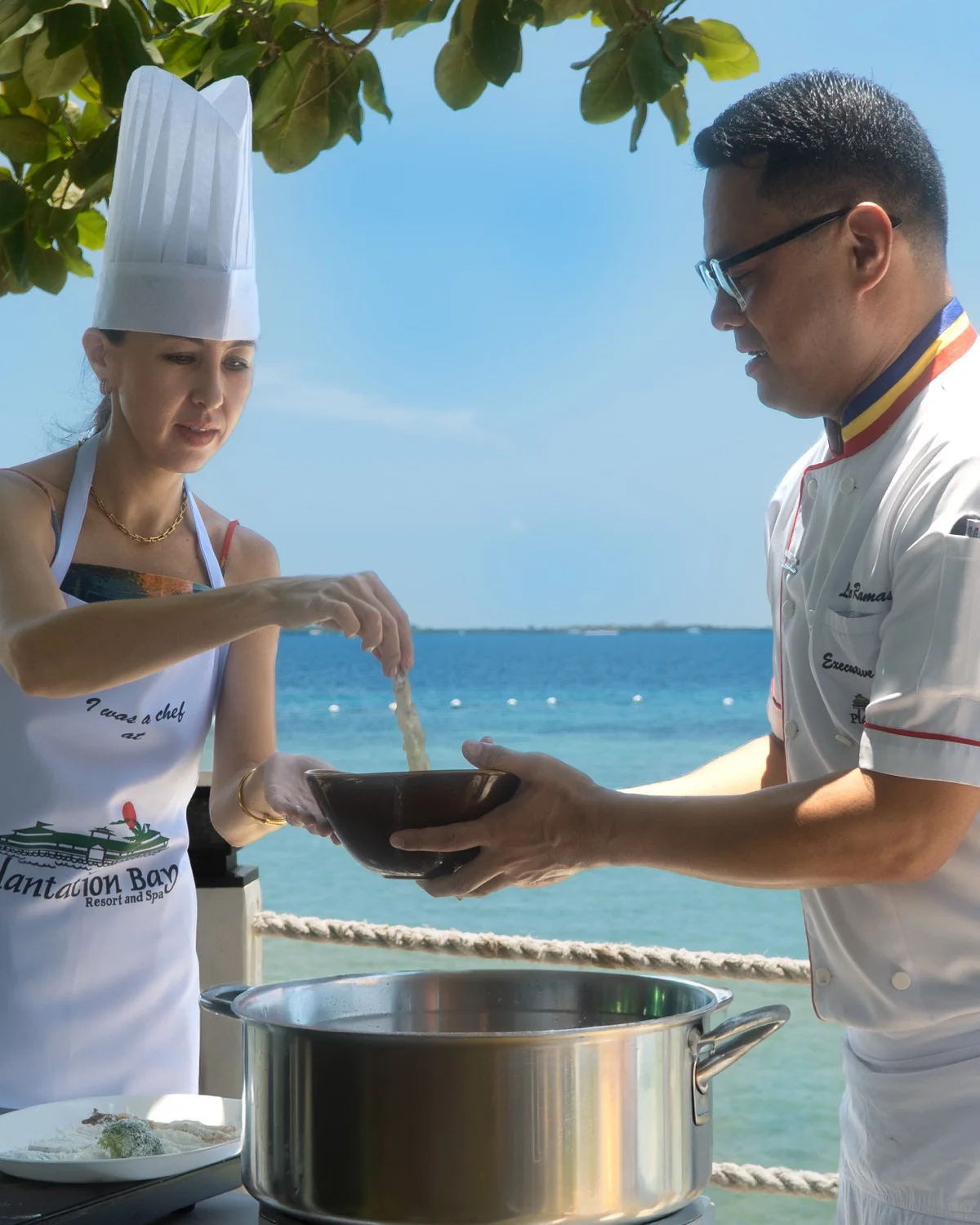 Cooking session with a Plantation Bay chef beside the sea