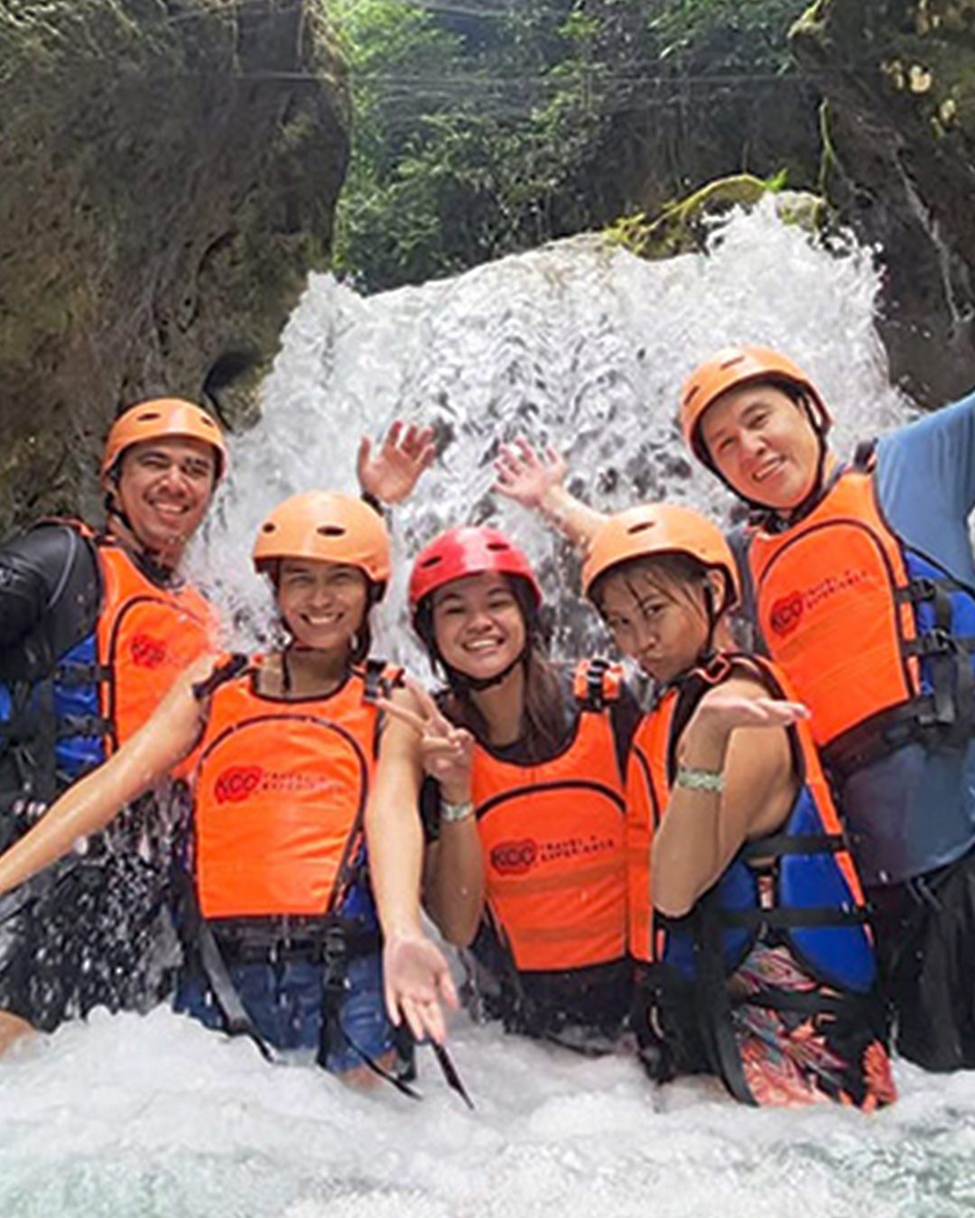 Canyoneering in a jungle river canyon