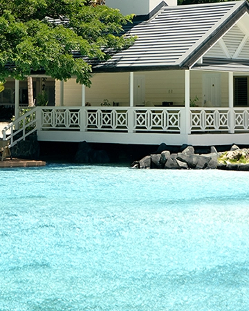 The Riverboat suite seen from the peninsula across the lagoon